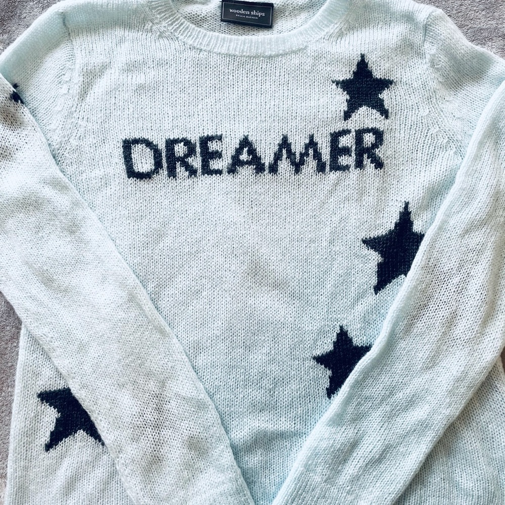 Soft light blue sweater.